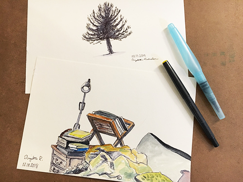 Two sketches done in ink and water brush, one of a pine tree; the other of a couch and book pile
