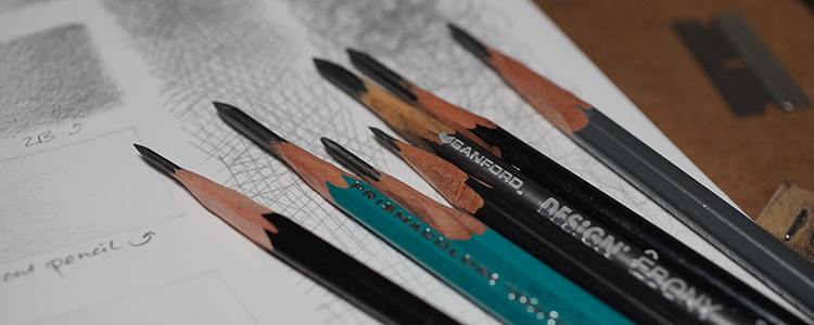 Close up of a razor-sharpened graphite pencils