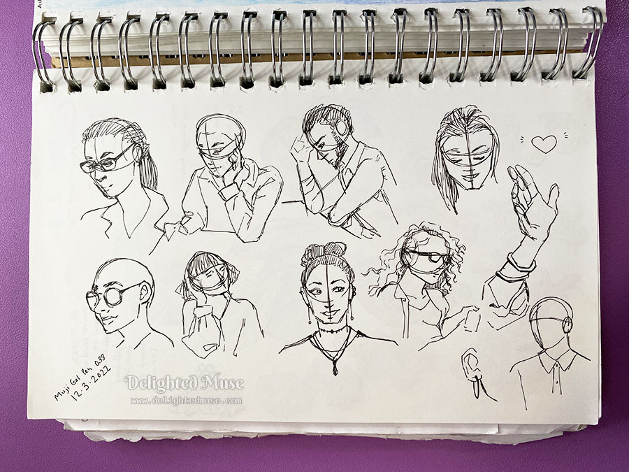 Sketchbook page of rough sketches of figures in black gel pen