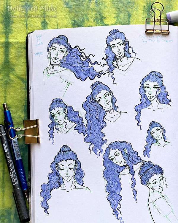 A sketchbook page of multiple portraits of the same character, with long wavy hair. The sketches are in black ink, with light green under sketches. Only the hair is colored in with marker, with a light purple-blue shade. To the left of the sketchbook is a Copic Multiliner 0.1 pen and a blue mechanical pencil.