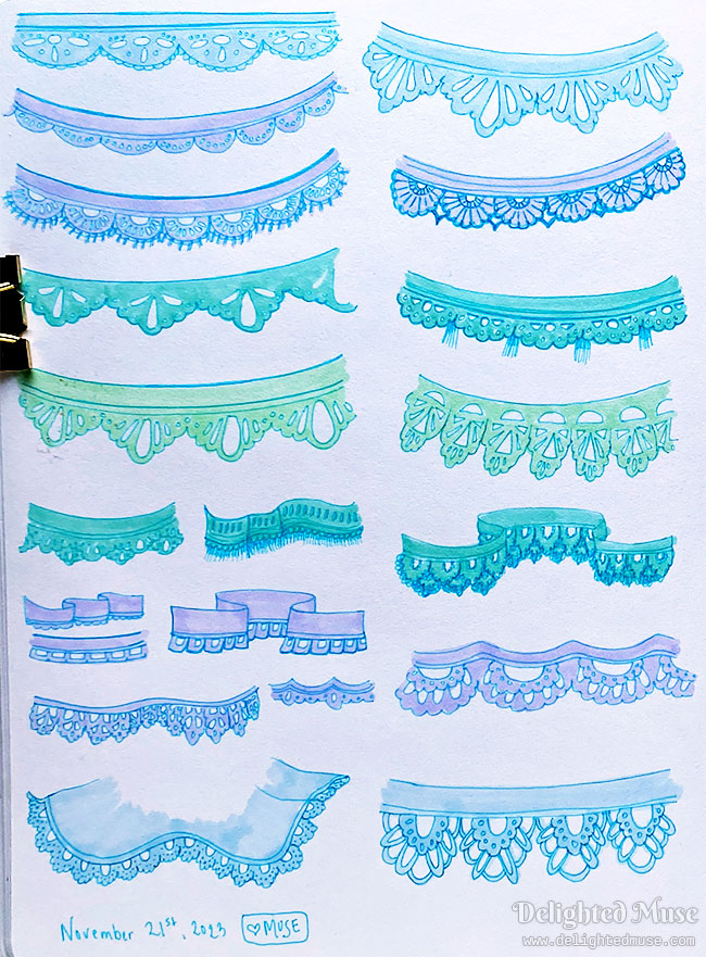 A sketchbook page of ribbon trim lace drawings, most of which are light blue, some light green.