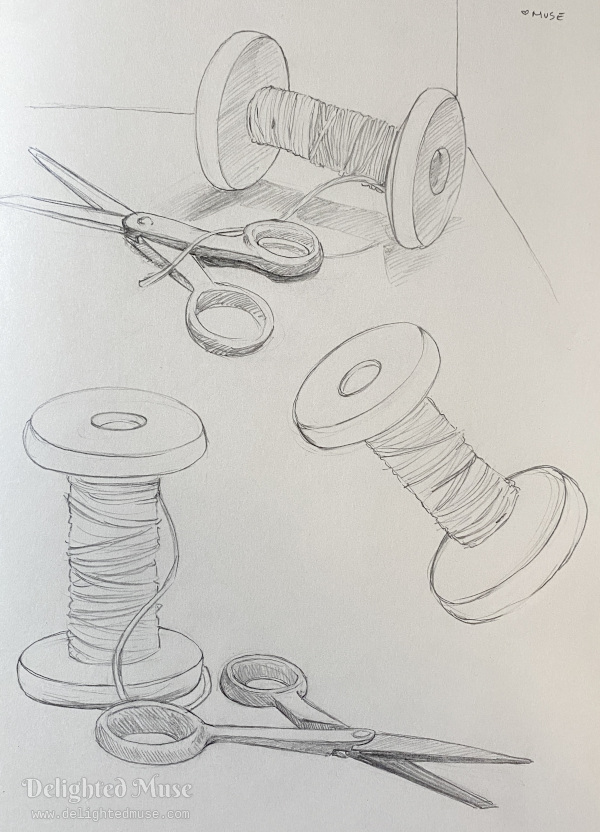 A sketchbook page with studies of a large antique wooden spool with thread, and a small pair of modern scissors.